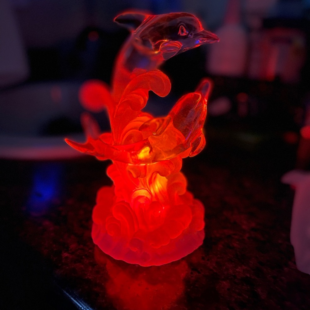 Dolphin light up changes colors. Approx height 6”